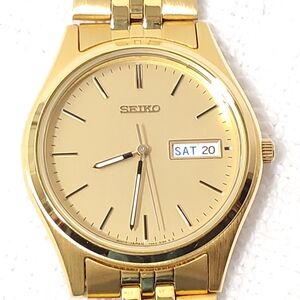 Vintage Seiko Men's Gold Tone Day Date Quartz Watch One Jewel Stainless Steel